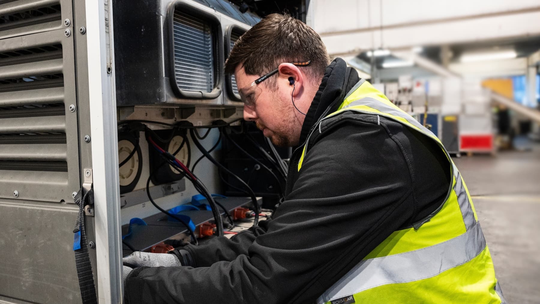 Technician repairing a ULD at a certified Unilode service centre