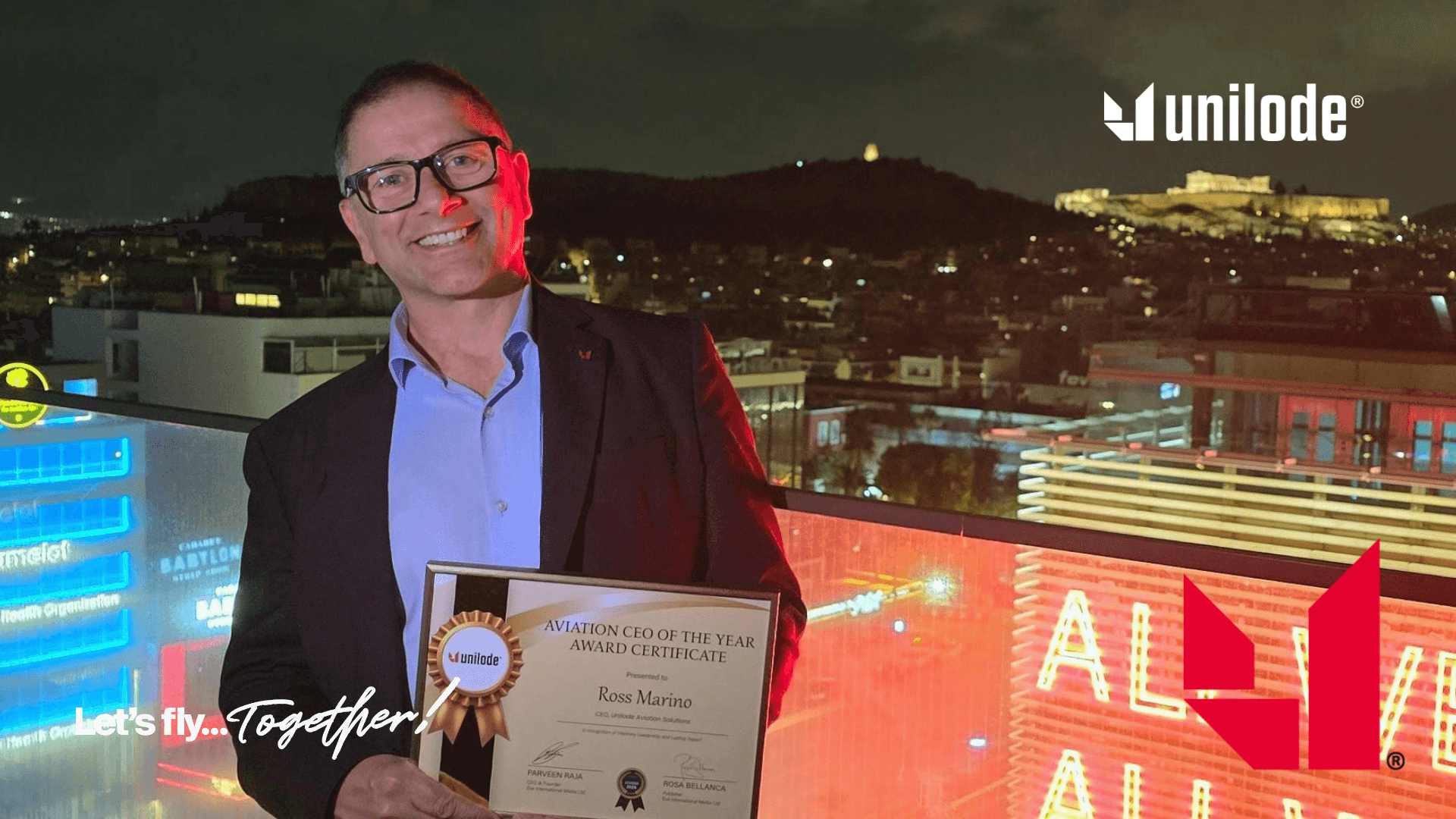 Ross Marino holding the Aviation CEO of the Year award certificate