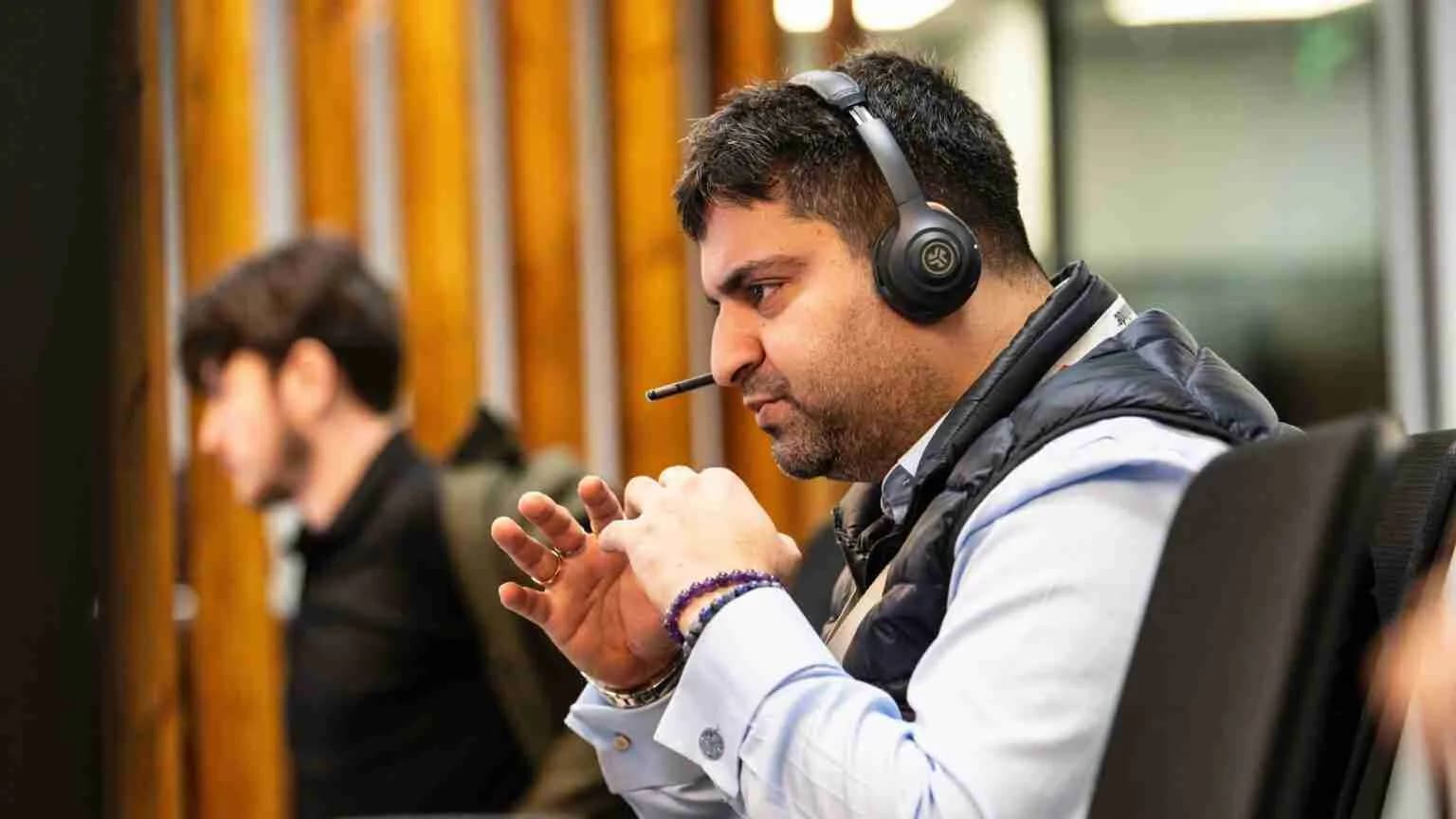 A Unilode Operations Control Centre agent on a headset