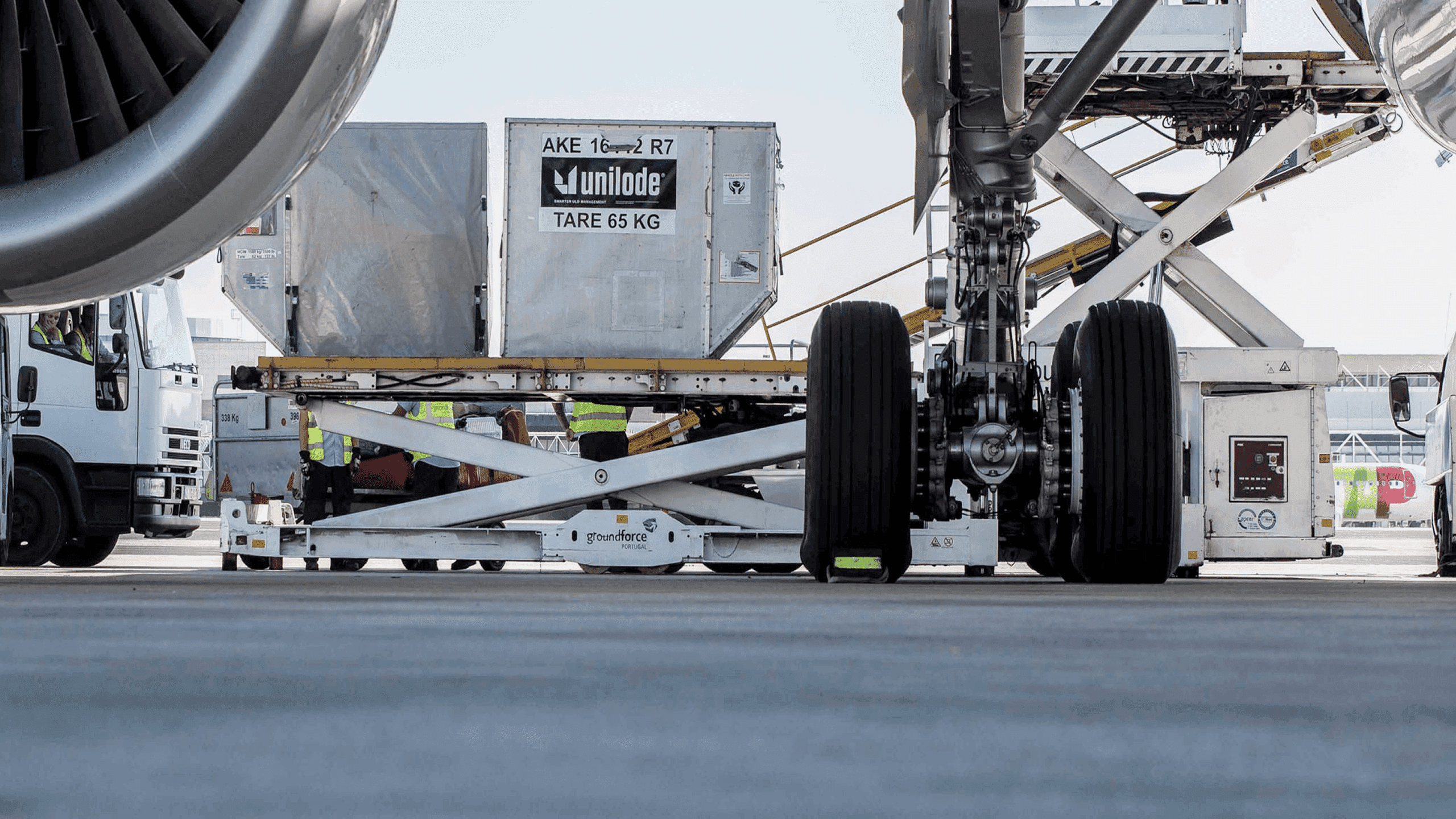 Unilode ULDs being handled on an airport apron